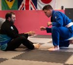 Two Submission Scoundrel students about to take part in a BJJ match